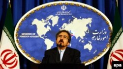 Iranian Foreign Ministry's new spokesman Bahram Ghasemi addresses journalists during his first media conference following his appointment as the ministry's new spokesman, in Tehran, on August 22.