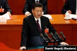 Си Цзиньпин выступает на заключительном заседании 1-й сессии Всекитайского собрания народных представителей (ВСНП) 13-го созыва. 20 марта 2017 года