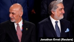 Ashraf Ghani (left) and Abdullah Abdullah both believe they should be president. Will it lead to violence?