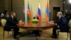 Russian President Vladimir Putin (center) hosts talks between Azerbaijani President Ilham Aliyev (left) and Armenian President Serzh Sarkisian(right). 