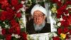 A portrait of former Afghan President Sibghatullah Mojaddedi is seen during his funeral procession at the presidential palace in Kabul on February 13.