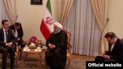 حسن روحانی و بشار اسد روسای جمهور ایران و سوریه و محمود واعظی رئیس دفتر روحانی