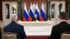 Russian President Vladimir Putin gives a statement to the media in Moscow in the early morning of May 11.