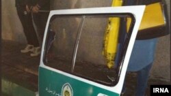 Protesters defending women who were detained for violating hijab rules ripped the door of a police van in Tehran. February 15, 2019