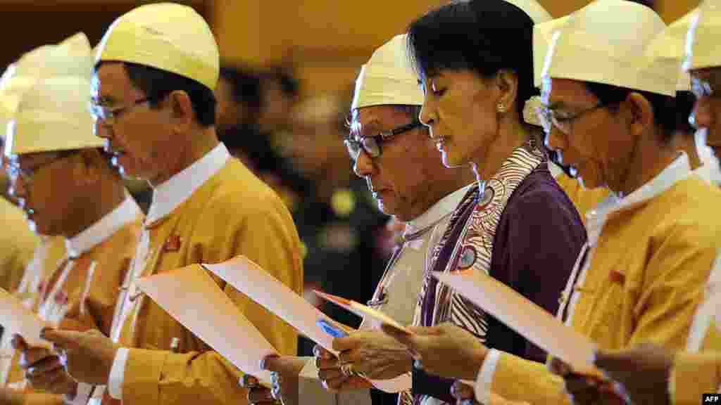 Suu Kyi reads her parliamentary oath in the lower house of parliament on May 2, 2012.