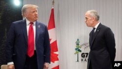 Predsjednik Sjedinjenih Država Donald Trump i kanadski premijer Mark Carney na samitu G7, 16. juni 2025.