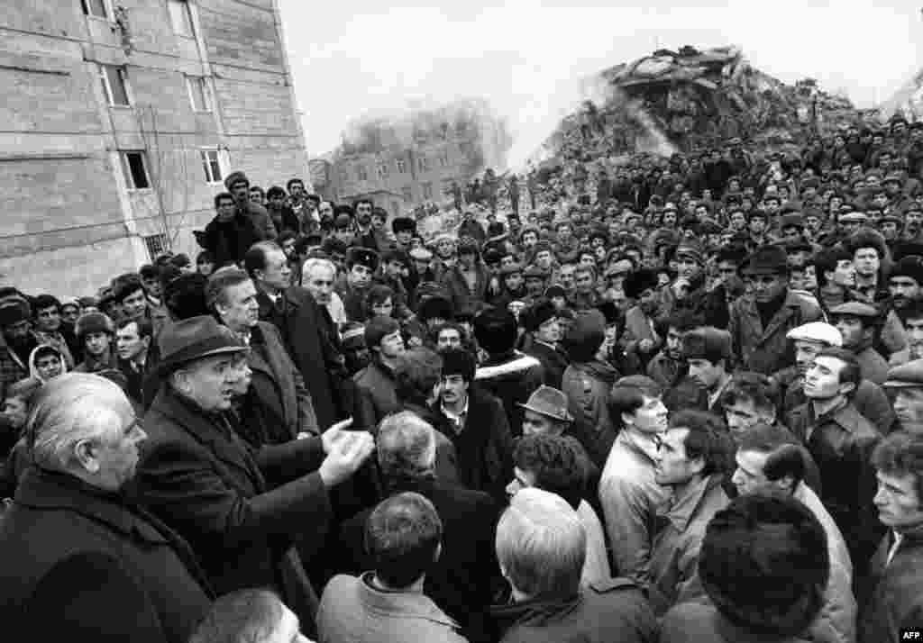 Soviet leader Mikhail Gorbachev (left) cut short a visit to New York, where he had been feted by the press and thousands of cheering Americans, to fly into Soviet Armenia&#39;s nightmare.