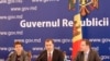 Премьер-министр Молдавии Влад Филат (в центре) уверен в успехе реформ.
