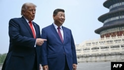 US President Donald Trump and Chinese leader Xi Jinping visit the Temple of Heaven in Beijing on May 14. 