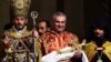 Armenia - Billionaire Samvel Karapetian (C) takes part in a Christmas Mass at the Armenian Apostolic Church's main cathedral in Echmiadzin, 6Jan2015.