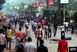 Під час сутички між прихильниками і супротивниками президента біля Каїрського університету раніше 3 липня 2013 року