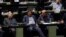 Abdolnaser Hemmati (center), Governor of the Central Bank of Iran, listens to a speech over the a bill to counter terrorist financing in parliament in Tehran, October 7, 2018