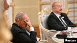 Armenian Prime Minister Nikol Pashinian and Azerbaijani President Ilham Aliyev take part in the CIS leaders' summit in Dushanbe, Tajikistan October 10, 2025.