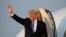 U.S. President Donald Trump boards Air Force One in Morristown, New Jersey on his way back to Washington on August 20.