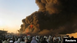 FILE. Burning fuel tankers in Balochistan Province.
