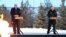 Russian President Vladimir Putin (right) and Belarusian President Alyaksandr Lukashenka attend a ceremony to unveil the memorial complex to Soviet civilians killed during World War II, as part of commemorative events marking 80 years since Leningrad siege was lifted, in the village of Zaitsevo in the Leningrad region on January 27.