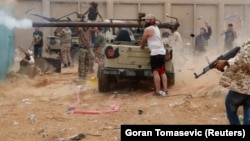Razmeštanje turskih kopnenih trupa u Libiji svakako bi dovelo do dalje eskalacije sukoba (fotografija: borci GNA u sukobu sa snagama Kalifa Haftara, maj 2019.)