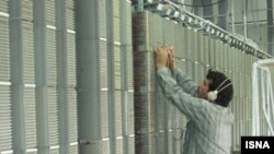 A worker at the state-owned Telecommunication Company of Iran