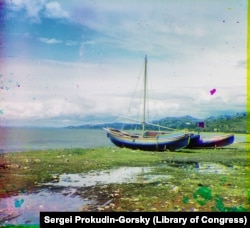 Boats sit idle along the seashore near Batumi.