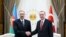 Turkey -- Turkish President Tayyip Erdogan (R) poses with his Azeri counterpart Ilham Aliyev during a welcoming ceremony in Ankara, March 15, 2016