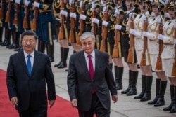 Қытай басшысы Си Цзиньпин және Қазақстан президенті Қасым-Жомарт Тоқаев. Пекин, 11 қыркүйек 2019 жыл.