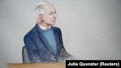 U.K. -- WikiLeaks founder Julian Assange is seen in the courtroom sketch during a case management hearing in Assange's U.S. extradition case at Westminster Magistrates Court, in London, October 21, 2019