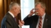 U.S. Defense Secretary Jim Mattis (L) talks with National Security Adviser John Bolton during a bilateral meeting between U.S. President Donald Trump and French President in the Cabinet Room at the White House in Washington, April 24, 2018
