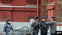 Prosecutors say the gang used intimate knowledge of Russian police protocol to carry out the crimes. (file photo)