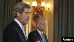 U.S. Secretary of State John Kerry (left) and British Foreign Secretary William Hague hold a joint news conference in central London on February 25.