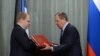 Министры иностранных дел России и Эстонии обмениваются договорами о границе, подписанными в Москве 18 февраля 2014 года