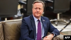 Britain's Foreign Secretary David Cameron