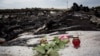 Уламки збитого літака рейсу MH17 біля Грабового в Донецькій області. Липень 2014 року 