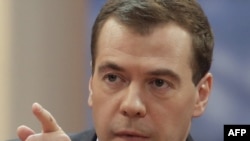 Russian President Dmitry Medvedev speaks during his televised interview on December 24.