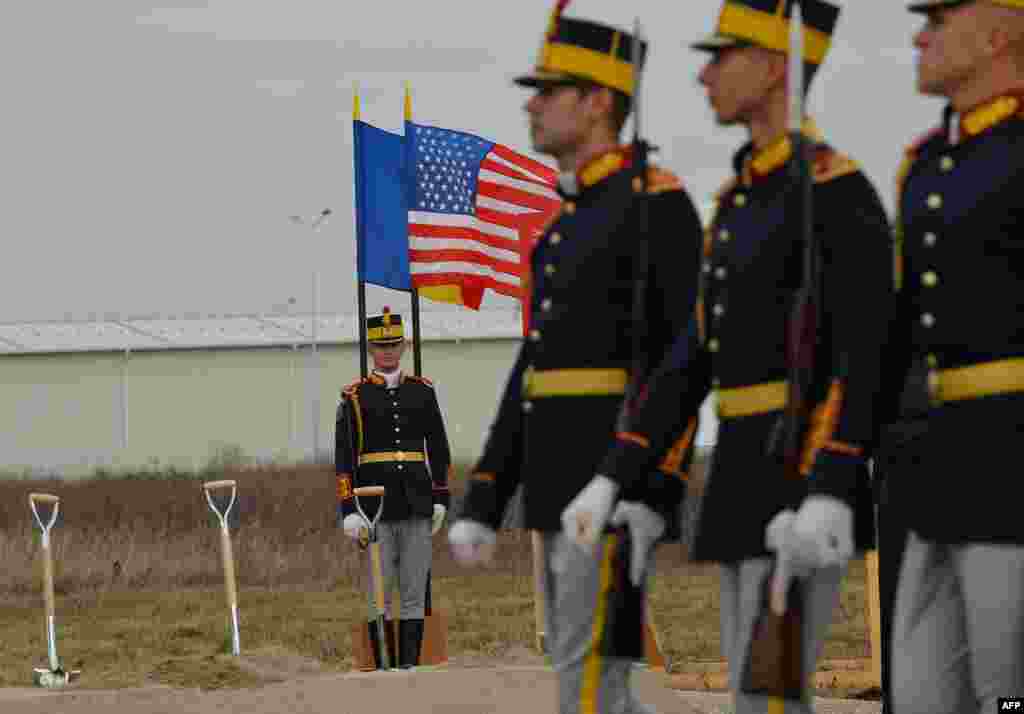Romanian soldiers guard the site of the official groundbreaking ceremony at the former Deveselu military airbase in Deveselu village on October 28. (AFP/Daniel Mihailescu)