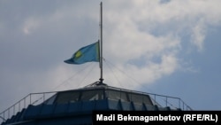 The Kazakh flag was at half-mast atop the national museum and other official buildings on June 5 to honor the dead border troops and ranger.