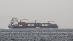 A commercial vessel passes through an international shipping lane off Yemen's Hanish Island in the Red Sea on July 27.