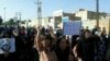 Workers of Iran's Haft-Tapeh sugar cane factory in a protesting on November 17.