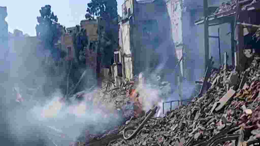 People inspect the damage at an impact site following US and Israeli strikes on Tehran. US President Donald Trump said in a speech that the United States had begun "major combat operations" against Iran on February 28 that are aimed at destroying Iranian missiles and the country's navy.