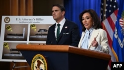 US Attorney for the District of Columbia Jeanine Pirro (R) and US Acting Attorney General Todd Blanche hold a news conference at the Department of Justice headquarters in Washington, DC, on April 27, 2026. 