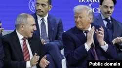 Switzerland - U.S. President Donald Trump and Armenian Prime Minister Nikol Pashinian attend the launch of the Board of Peace initiative in Davos, January 22, 2026.