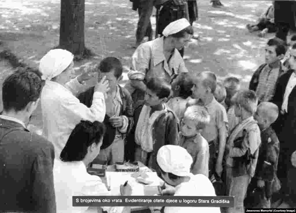 Children are issued numbers and documented by name at Stara Gradiska in 1941.