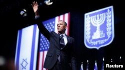 Israel -- U.S. President Barack Obama acknowledges the audience after delivering a speech on policy at the Jerusalem Convention Center, 21Mar2013