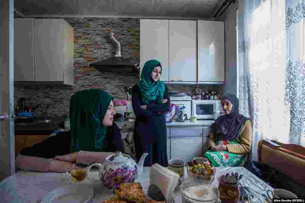 Relatives of Crimean Tatar men accused of “organizing a terrorist cell.”