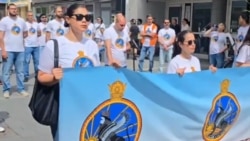 Symbols Of The Shah's Secret Police Seen At Iranian Royalists Rallies Abroad