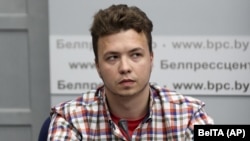Raman Pratasevich at a staged news conference at the Foreign Ministry in Minsk on June 14. Several diplomats and reporters left the event in protest.