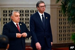 Doi lideri europeni care au relații bune atât cu Rusia cât și cu China - Viktor Orban (stânga), președintele Ungariei, și Aleksandar Vucic, președintele Serbiei, prezenți la Belt and Road Forum de la Beijing în octombrie 2023.