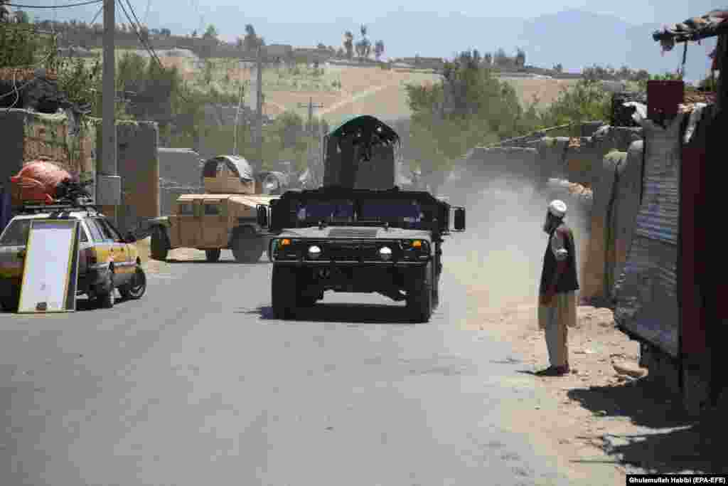Afghan security forces patrol the Alishang district of Laghman Province after reportedly clearing the area of Taliban fighters on July 8.&nbsp;
