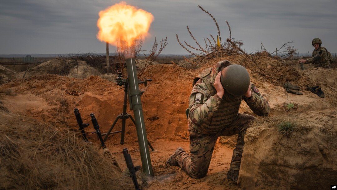 Soldiers of Ukraine's National Guard practice during combat training in the north of Ukraine on November 8.