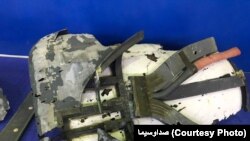 IRANIAN STATE TELEVISION SHOWS WHAT IT CALLS "RETRIEVED SECTIONS OF U.S. MILITARY DRONE" DOWNED BY IRAN. June 21, 2019