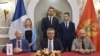 Premijer Crne Gore Milojko Spajić i Milutin Đukanović, predsjednik Odbora direktora Elektroprivrede (u sredini), sa predstavnicima francuske energetske kompanije.